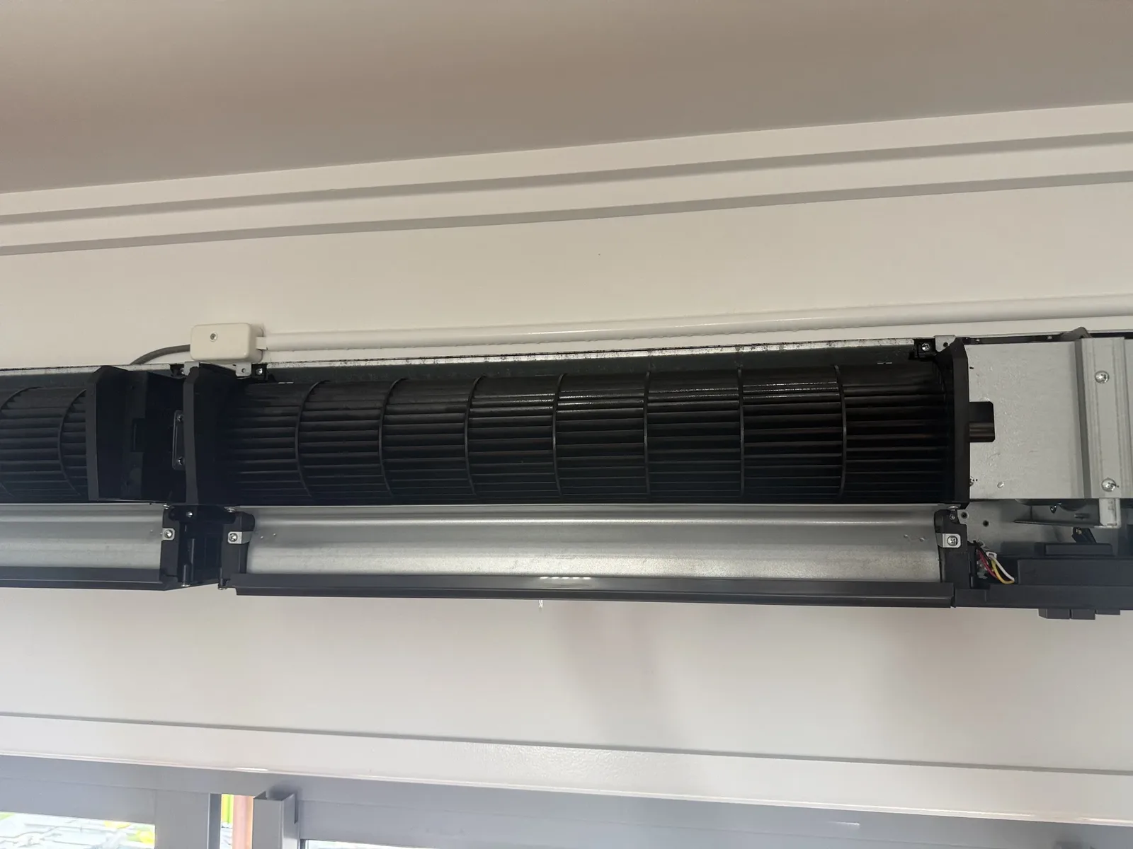 Before and after: air curtain unit cleaned